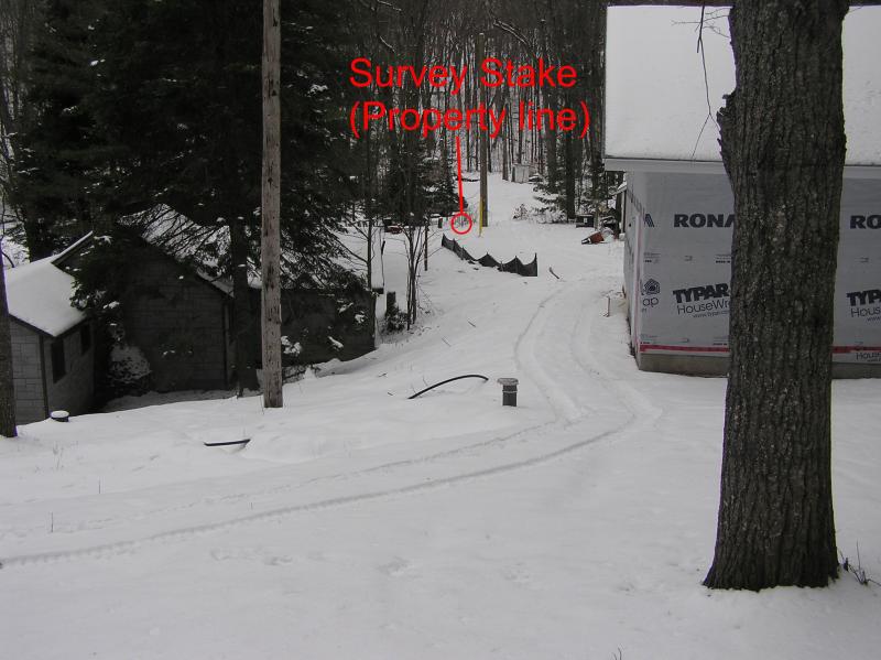 survey stake showing west boundary of property